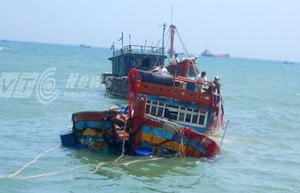 （C）  VTC,　以前、中国船の攻撃を受けて沈められた他のベトナム漁船