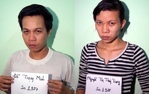 (C) doisongphapluat 逮捕されたミン容疑者(左)とチャン容疑者(右)