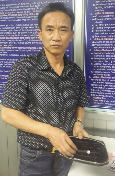 (C)nguoilaodong Xu Haisheng容疑者